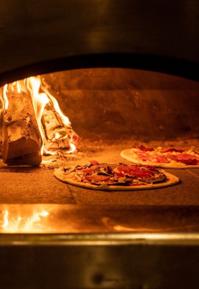 The delicious pizza and outdoor kitchen at a country Warwickshire wedding venue