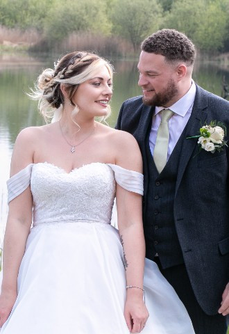 The lake makes a wonderful backdrop for your wedding photographs at De Vere Cotswold Water Park.