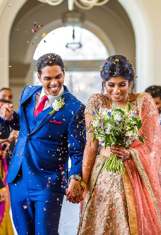 asian couple walking down the aisle after wedding married at their civil ceremony