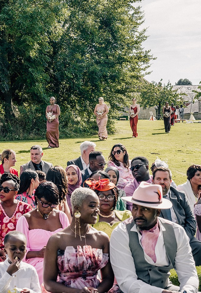 Bridesmaids walking to ceremony