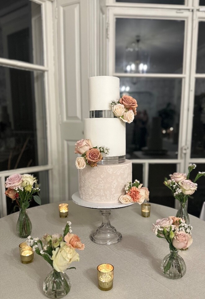 White & taupe wedding cake with stencil detail, 