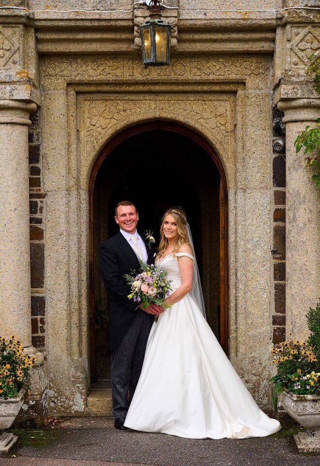 Wedding couple at entrance 