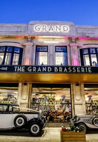 Night time outside view of The Grand Hotel