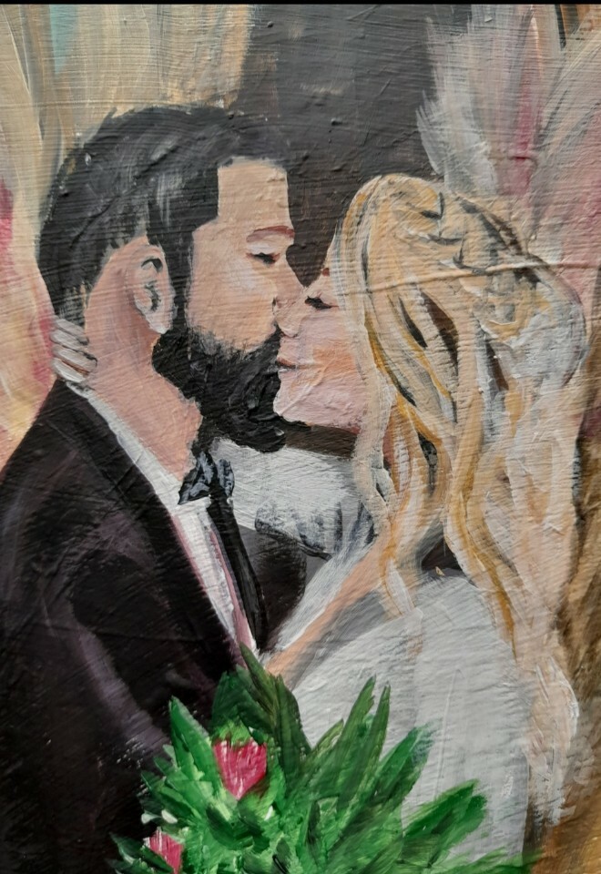 Kissing bride and groom