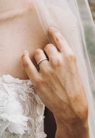 Diamond wedding band on bride from Anelli Ltd
