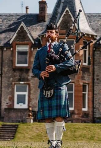 Piper at wedding at Shieldaig Lodge