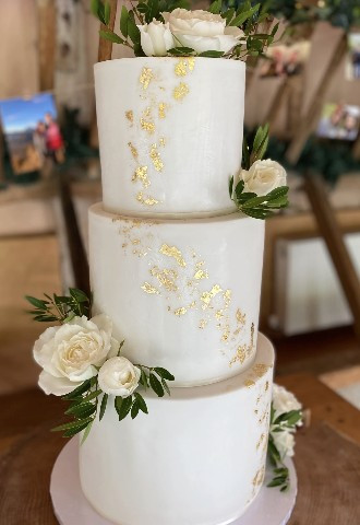 Fondanted tiers - cookies and cream, lemon with homemade lemon curd and raspberry and vanilla flavours. Gallery Cakes Oxfordshire