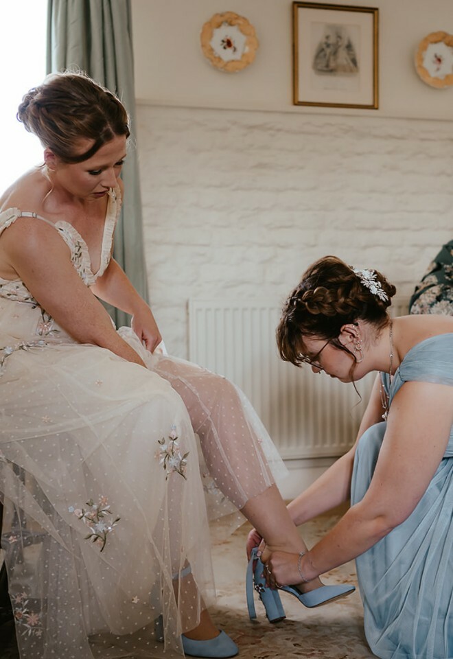 Getting Ready with bridal party in a beautiful in site accommodation, final touches mean everythng