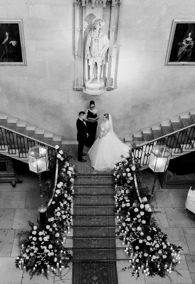 Jennifer Patrice, an experienced Independent Celebrant, with a happy couple on their wedding day, delivering an authentic, joyful, and personalised ceremony in a beautiful setting.