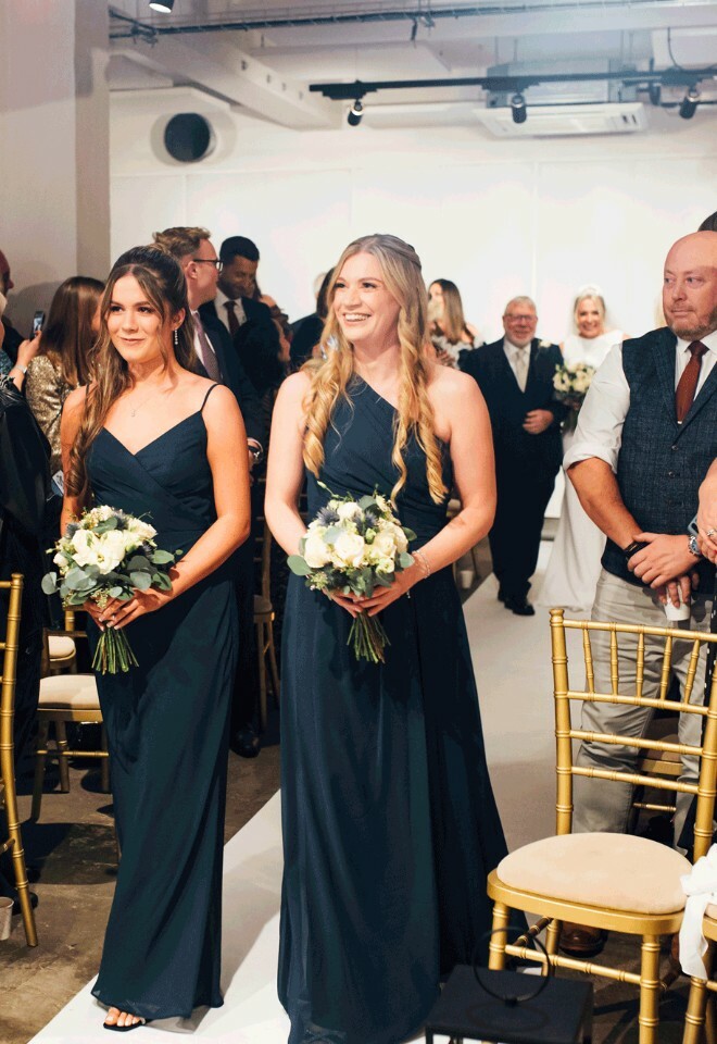 bridesmaids walking down aisle