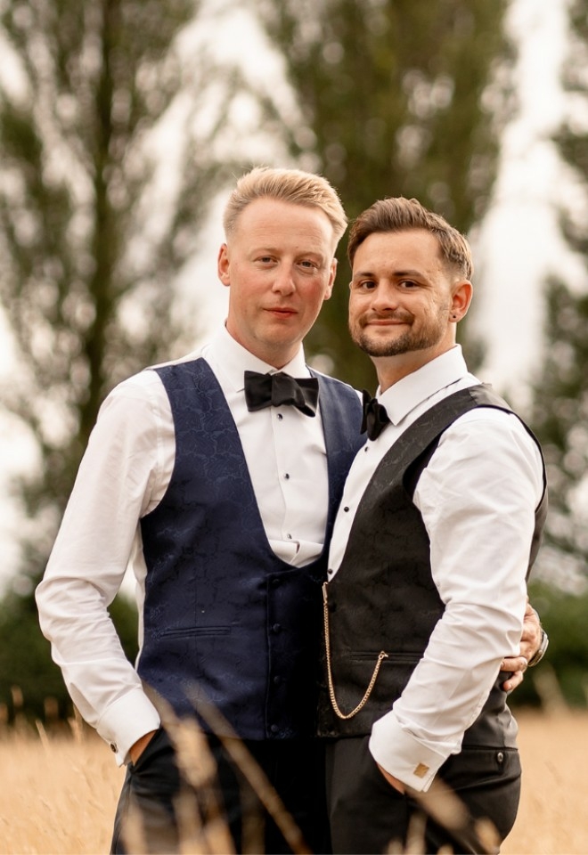 Happy couple at Silchester Farm with Poplar trees in the background