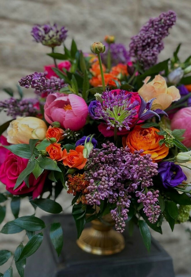 bright vibrant coloured peonies & roses, wedding table decoration from Oops a daisy, cirencester gloucestershire