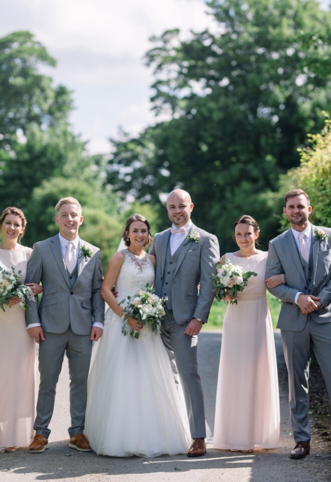 Bridal party in the grounds at Hall Farm Hotel