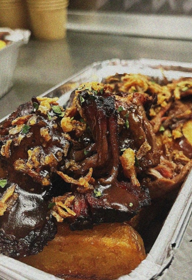 Triple cooked chunky chips topped with slow cooked beef brisket and gravy from Ray Mekhis street food wedding caterers in Wantage, Oxfordshire