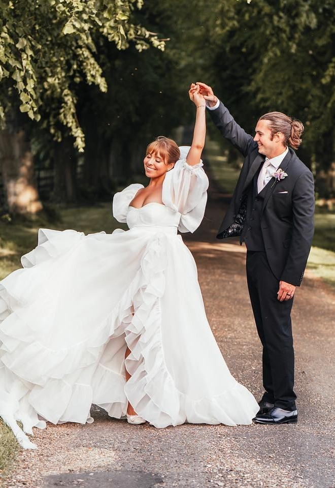 Bride and groom dancing on the Notley Abbey grounds