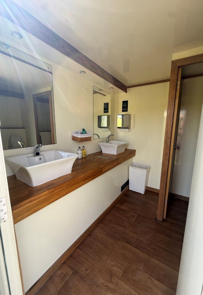 view of inside the luxury mobile toilet hire from Willow and Oak Events, perfect for any marquee weddings, parties and events