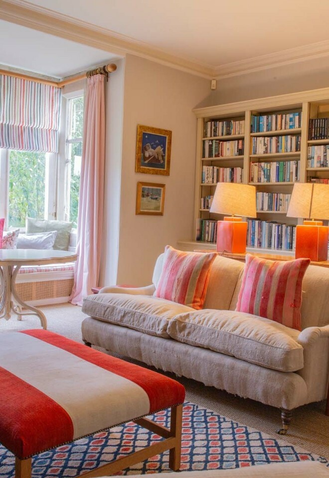 colourful accommodation room with a bookshelf at this wedding venue