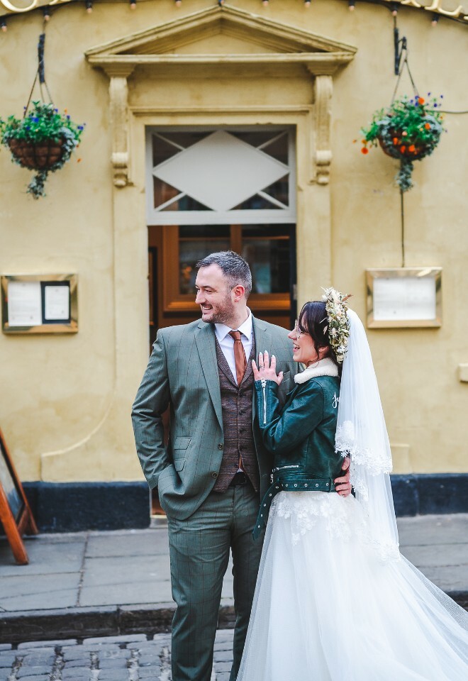 bride and groom outside bath city centre pub