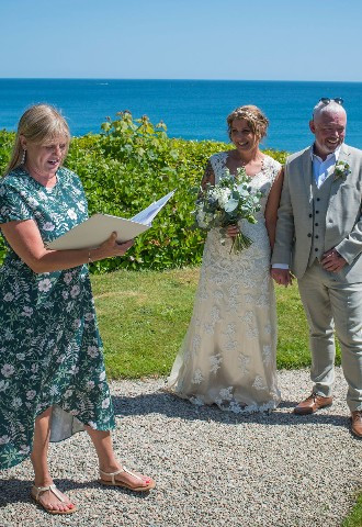 Celebrant Lisa with bride and groom at Porthpean House
