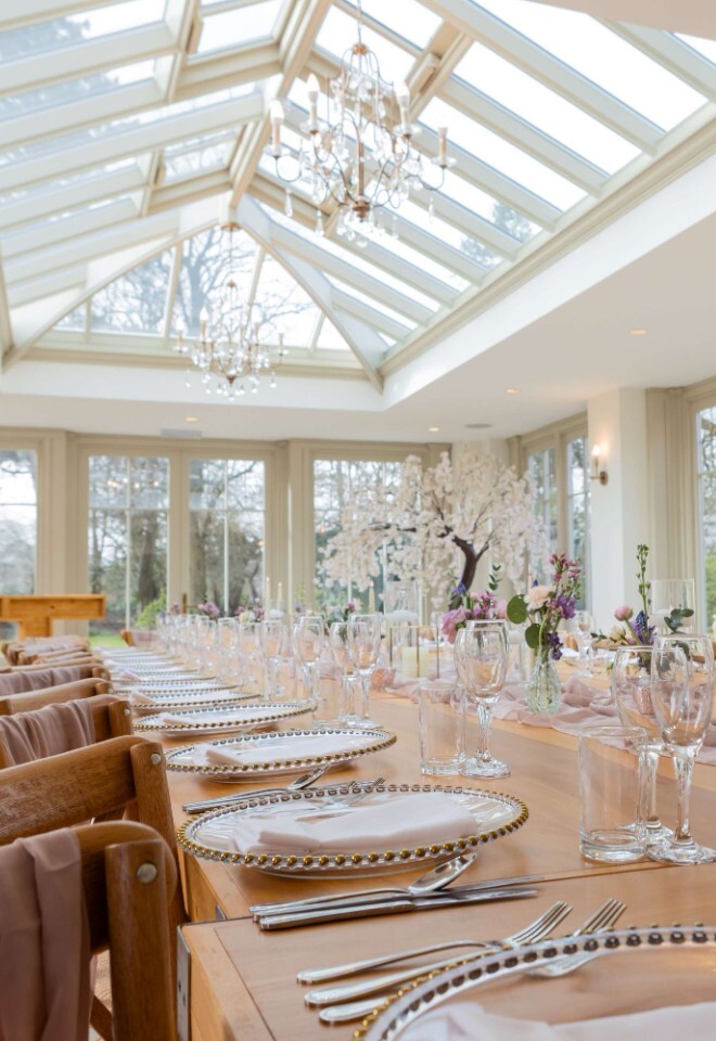 A table setup in the orangery at a country wedding venue in Northamptonshire