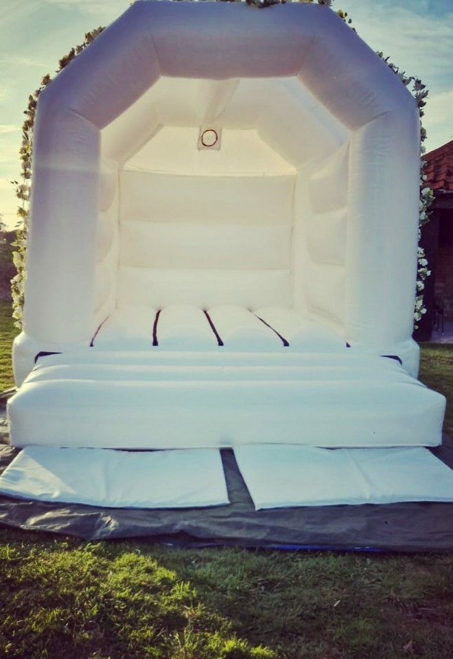 white bouncy castle hire, wedding entertainment in Suffolk