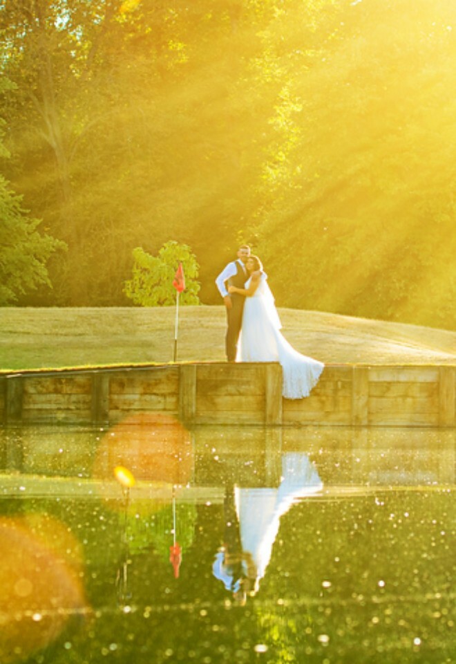 Married couple pond photo.