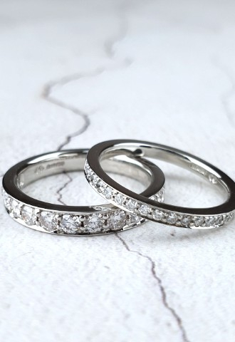 two wedding rings set with diamonds