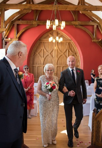 Bride walking down the aisle at Wokingham Town Hall, Berkshire