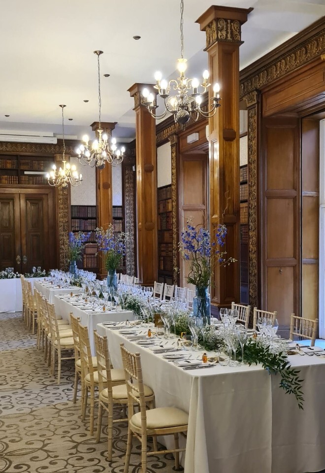Luxury wedding tablescape with blue delphiniums and foliage styling by FLOWERS BY ANYA in Somerset