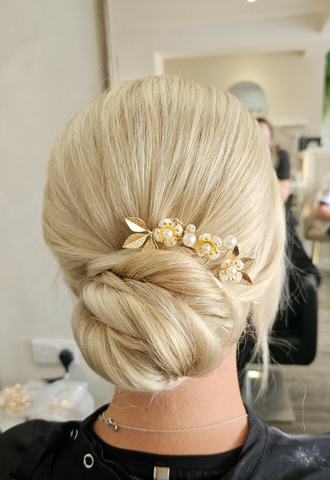 Low sleek textured bun