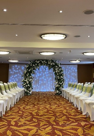 Hire Heaven flower arch & chair covers The Bull Hotel