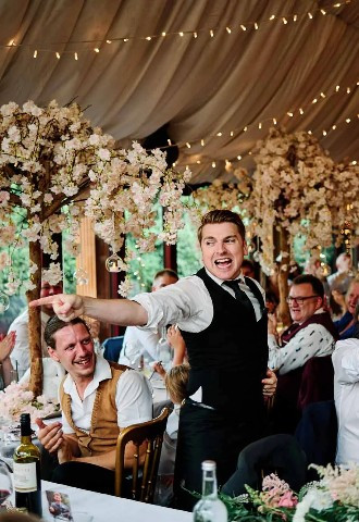 guests surprised by singing waiters at the crazy bear in stadhampton oxfordshire