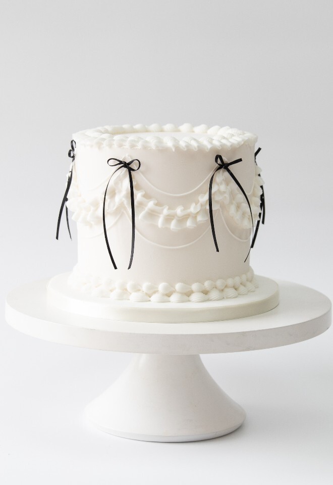 Piping and Bows Wedding Cake
