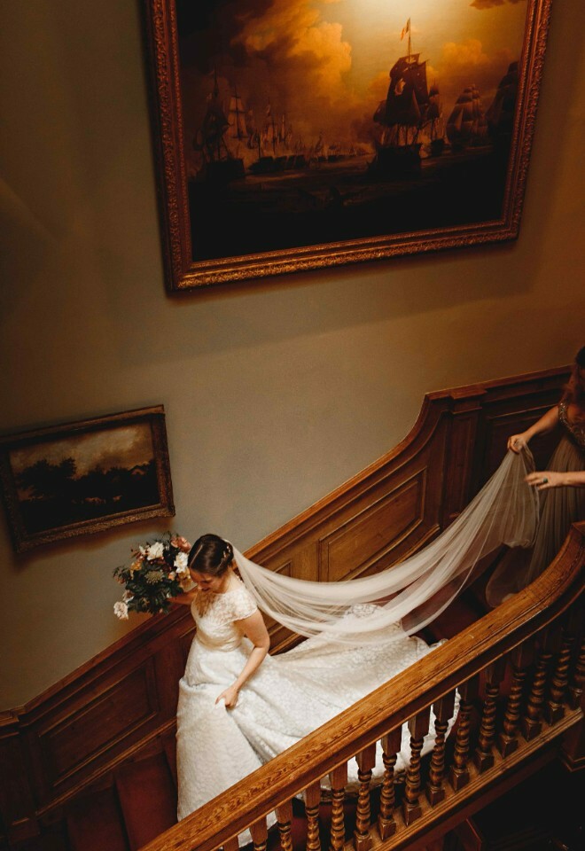 Sutton Bonington Hall bride on the staircase