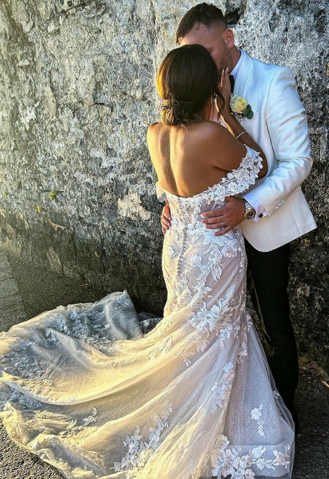 Bride and groom embracing