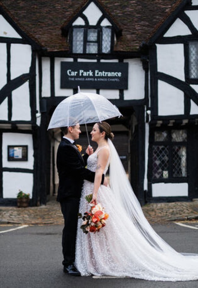 Couple photo in front of the Kings Arms Hotel