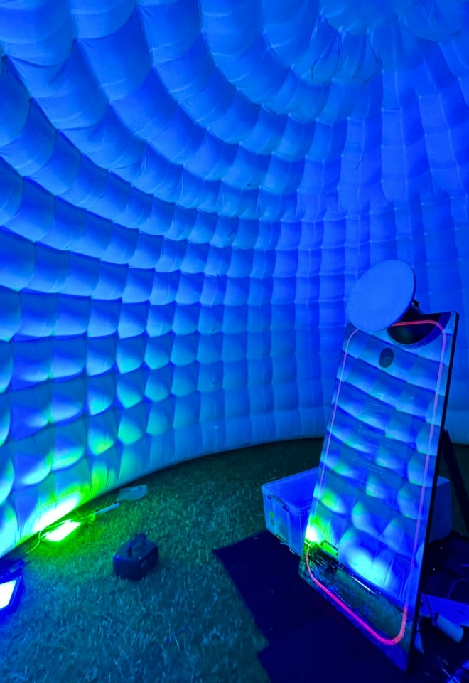 Magic mirror photobooth in an outdoor shell