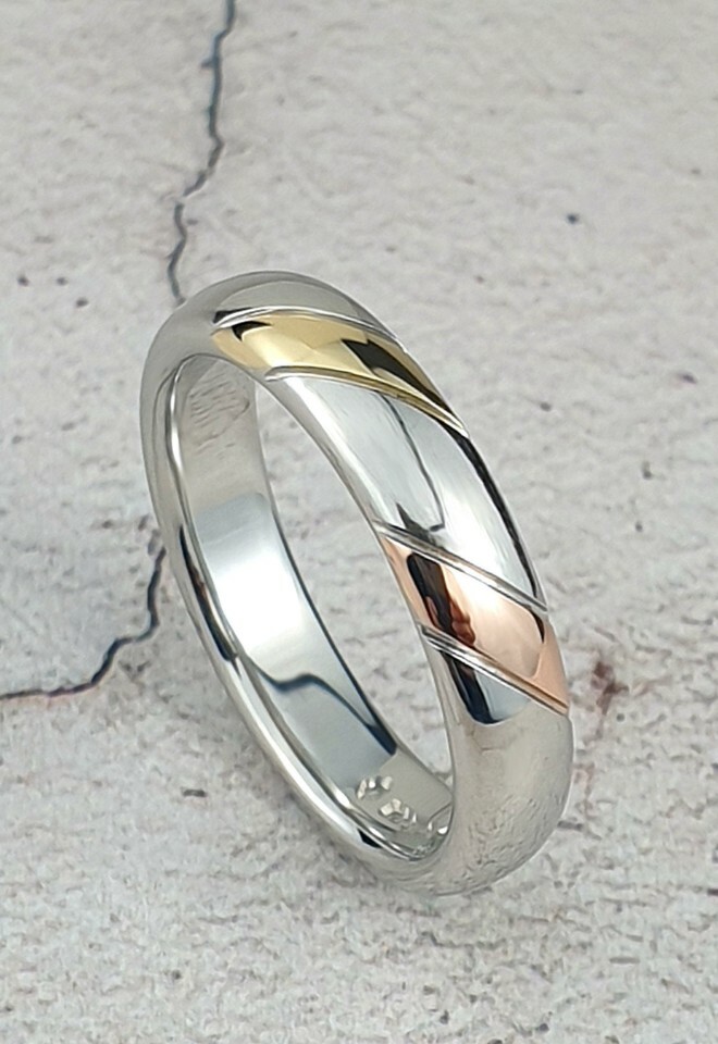 Custom made platinum band with stripes of yellow and rose gold