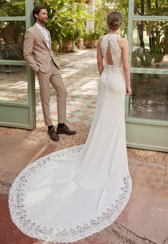Lucia from Alma Novia 2024 collection mermaid wedding dress lace bodice, crêpe skirt, halter neckline, open back