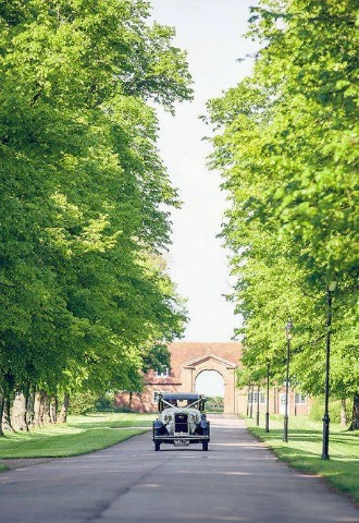 A stylish way to arrive for a wedding at Horwood House in Buckinghamshire