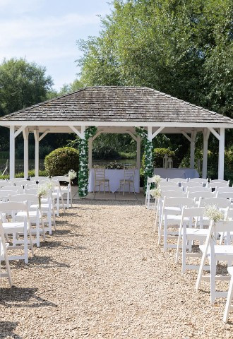 Outdoor wedding reception set up at voco Oxford Thames, Oxfordshire