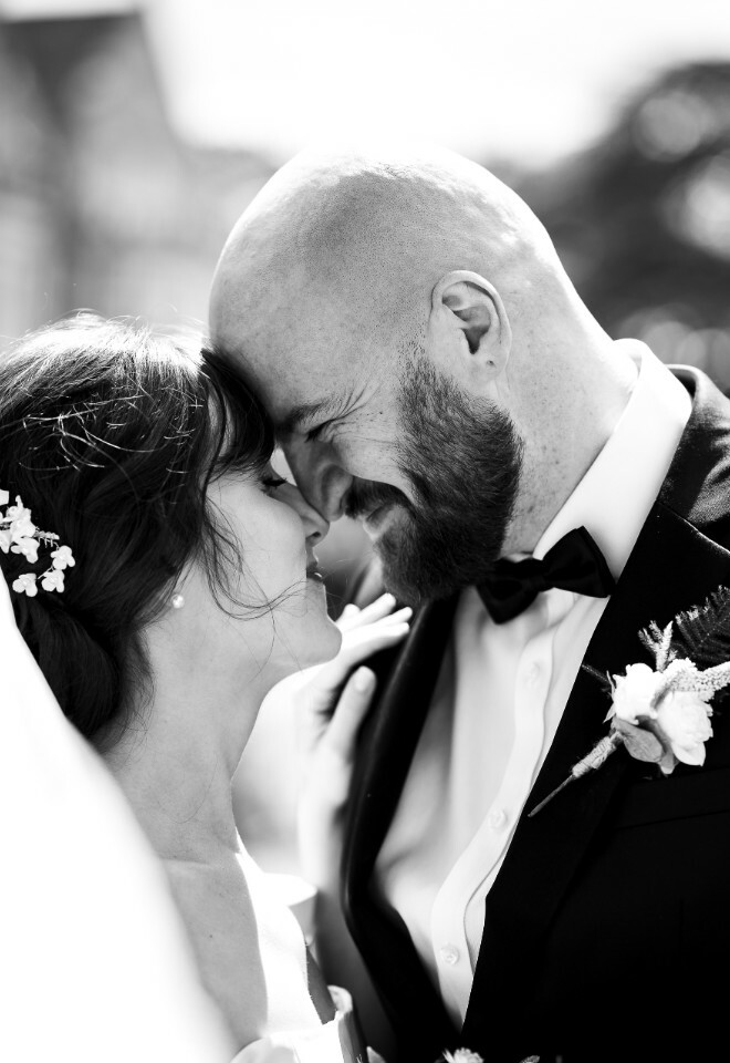 bride and groom eskimo kiss