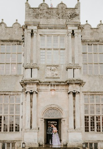 Brides sharing a kiss at Howsham Hall, North Yorkshire
