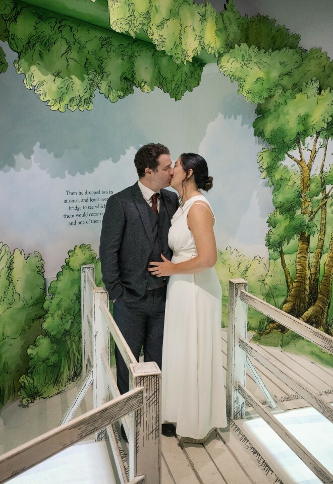 Bride & Groom Kissing in Winnie The Pooh