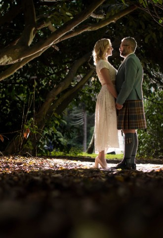 Wedding couple in the grounds at Melville Castle - a castle wedding venue near Edinburgh