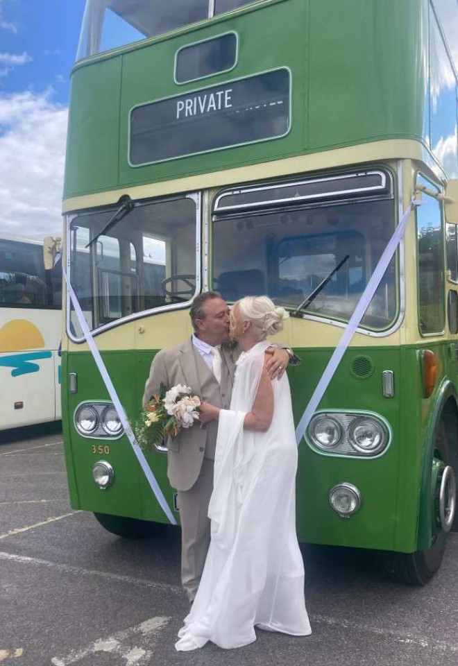 Kisses by a vintage bus 