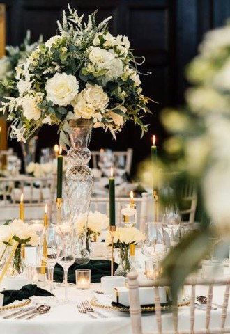 ivory floral centrepiece by make it special events