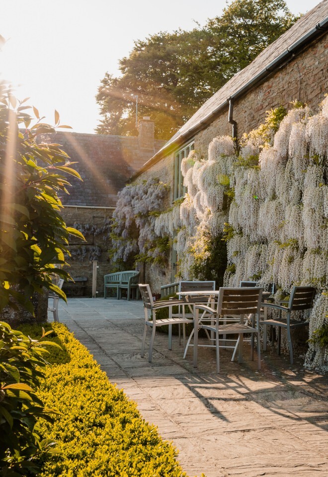 The grounds and barn at an exclusive Oxfordshire barn wedding venue