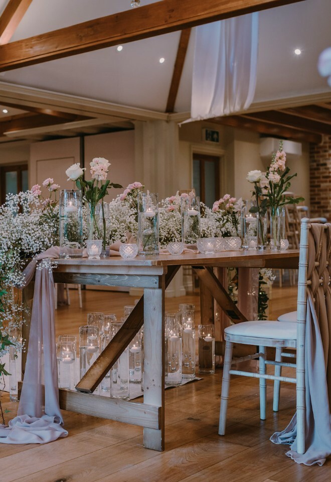 Wedding flowers, sashes, candles and venue decor from TJ Designer Weddings, Essex - weddings Mulberry House