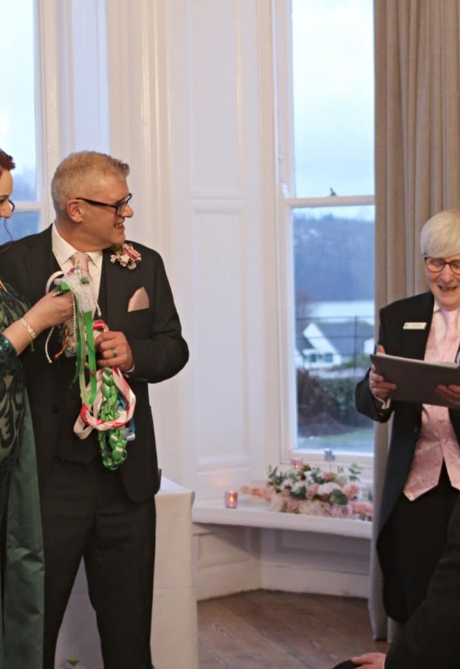 Couple handfasting with Jane
